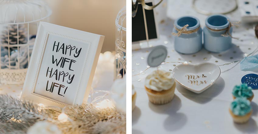 Weil die Deko passen muss. Edle Schälchen machen sich top und schöne weiße Bilderrahmen können auch das Motto zur Winter Wedding einrahmen - Im Hintergrund romantische Vogelkäfige mit Winterdeko (c) Svetlana Kohlmeier Fotografie